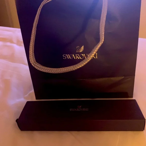 New Authentic Swarovski jewelry box and bag